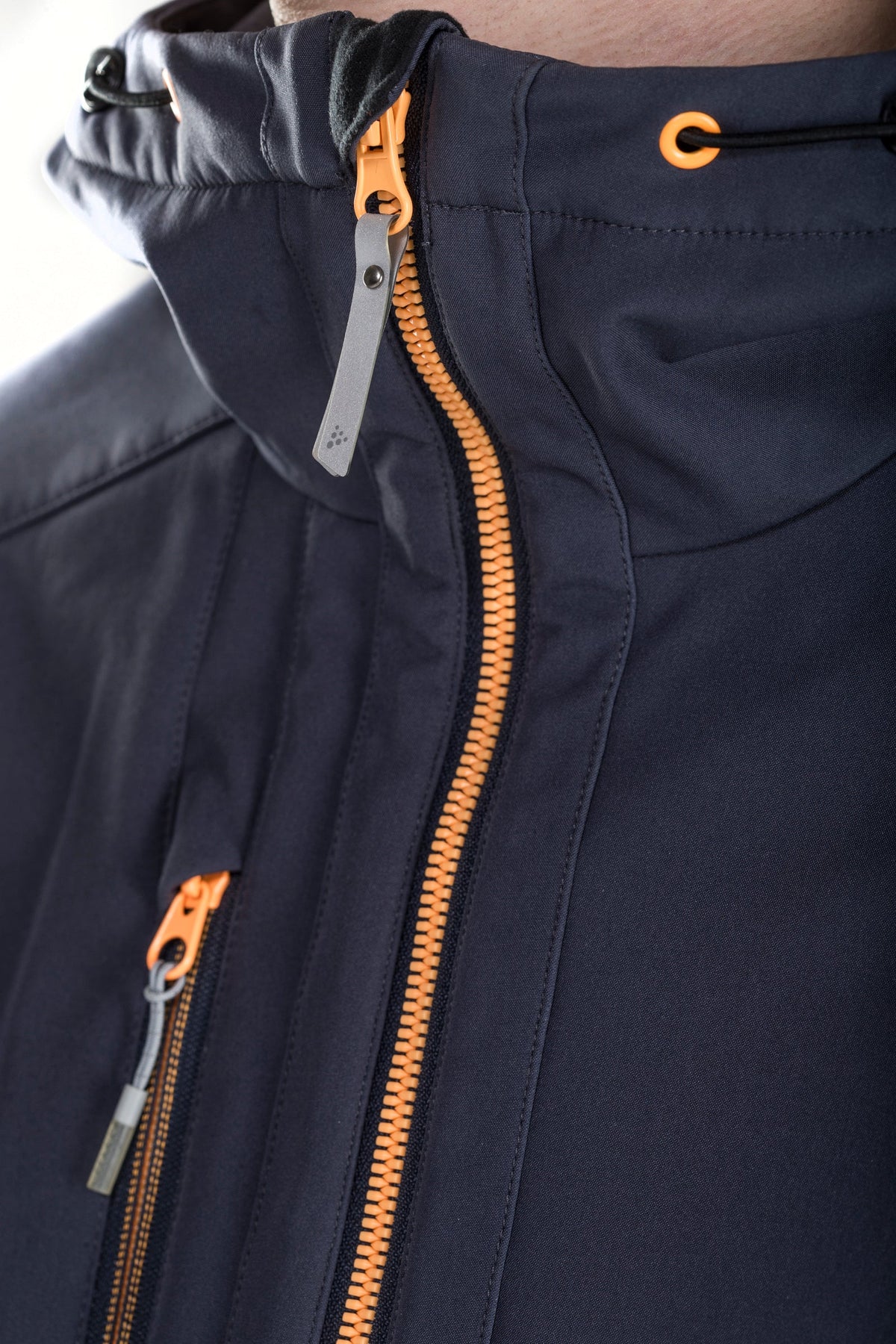 Craft Highland Jacket Herren in Orange/Grau, Detailansicht