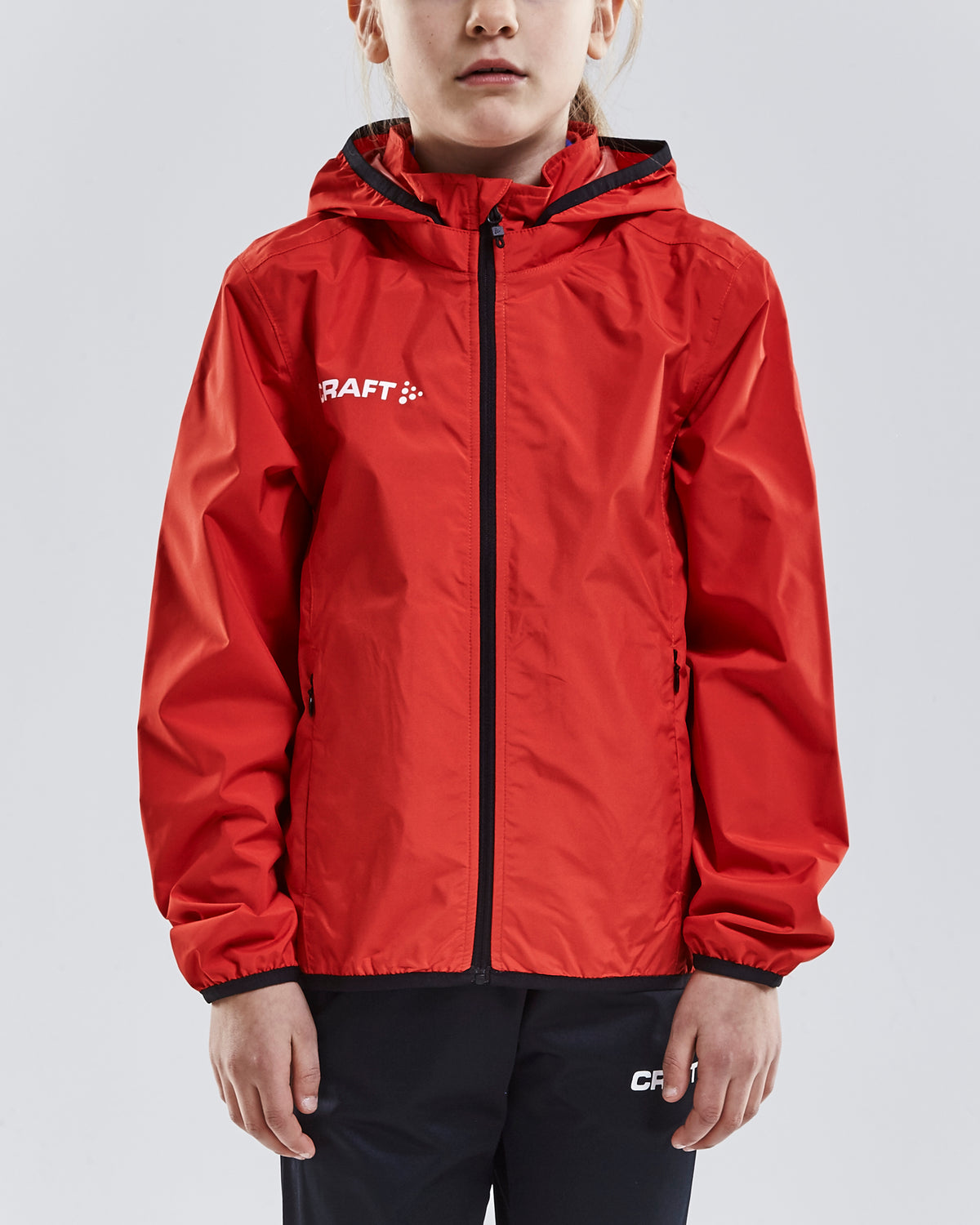 Craft Jacket Rain Junior in Rot, Detailansicht
