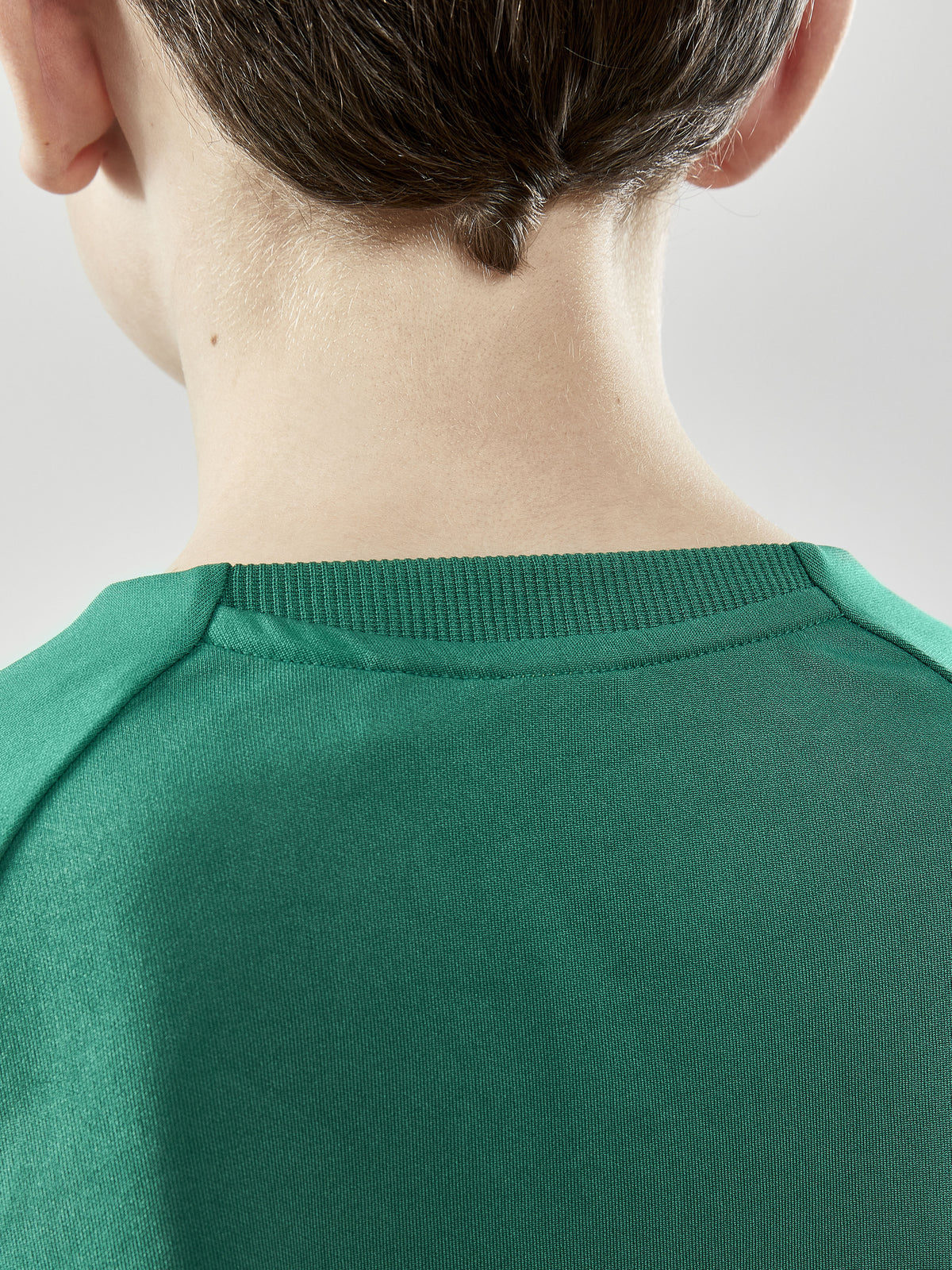 Craft Evolve Crew Neck Junior in Grün, Detailansicht