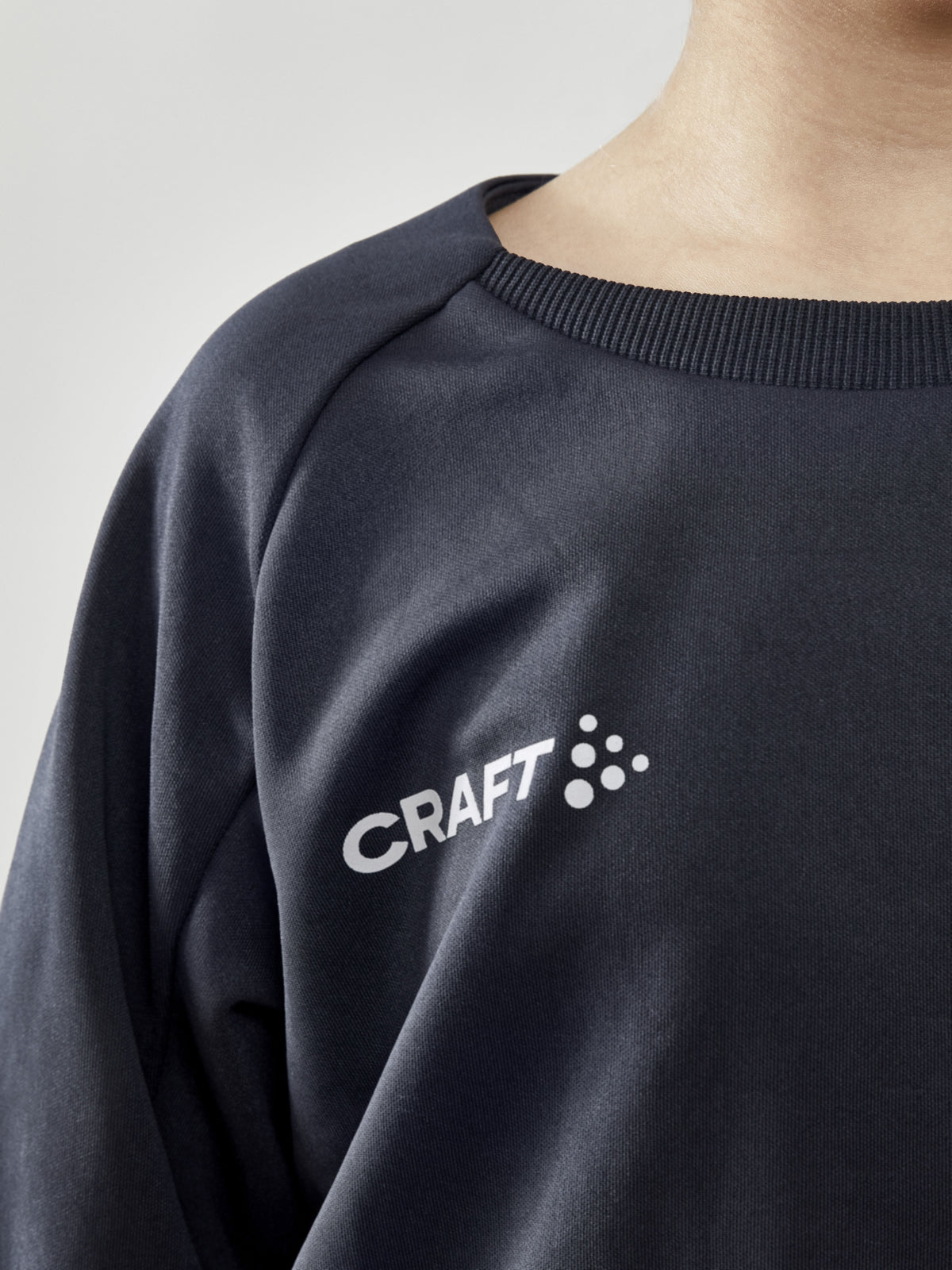 Craft Evolve Crew Neck Junior in Dunkelgrau, Detailansicht