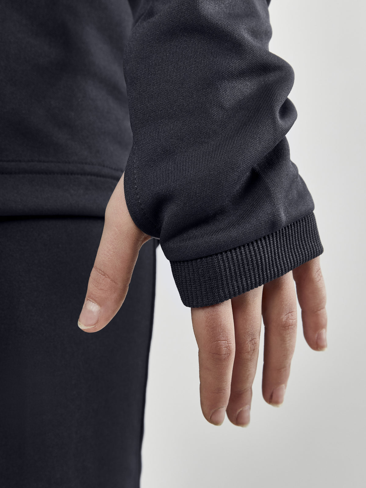 Craft Evolve Crew Neck Junior in Dunkelgrau, Detailansicht