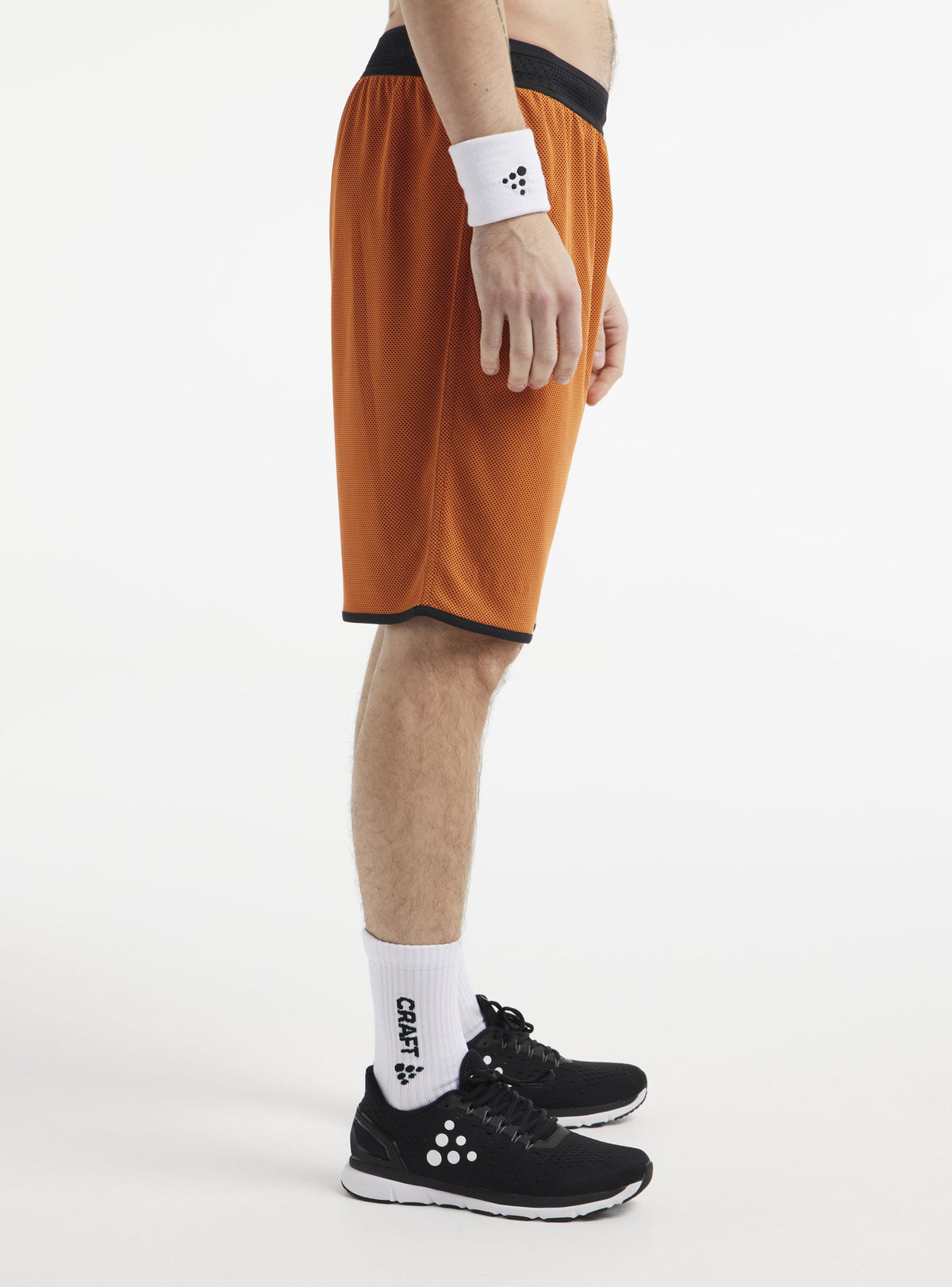 Craft Progress Reversible Basket Shorts Herren in Orange/Schwarz, Detailansicht