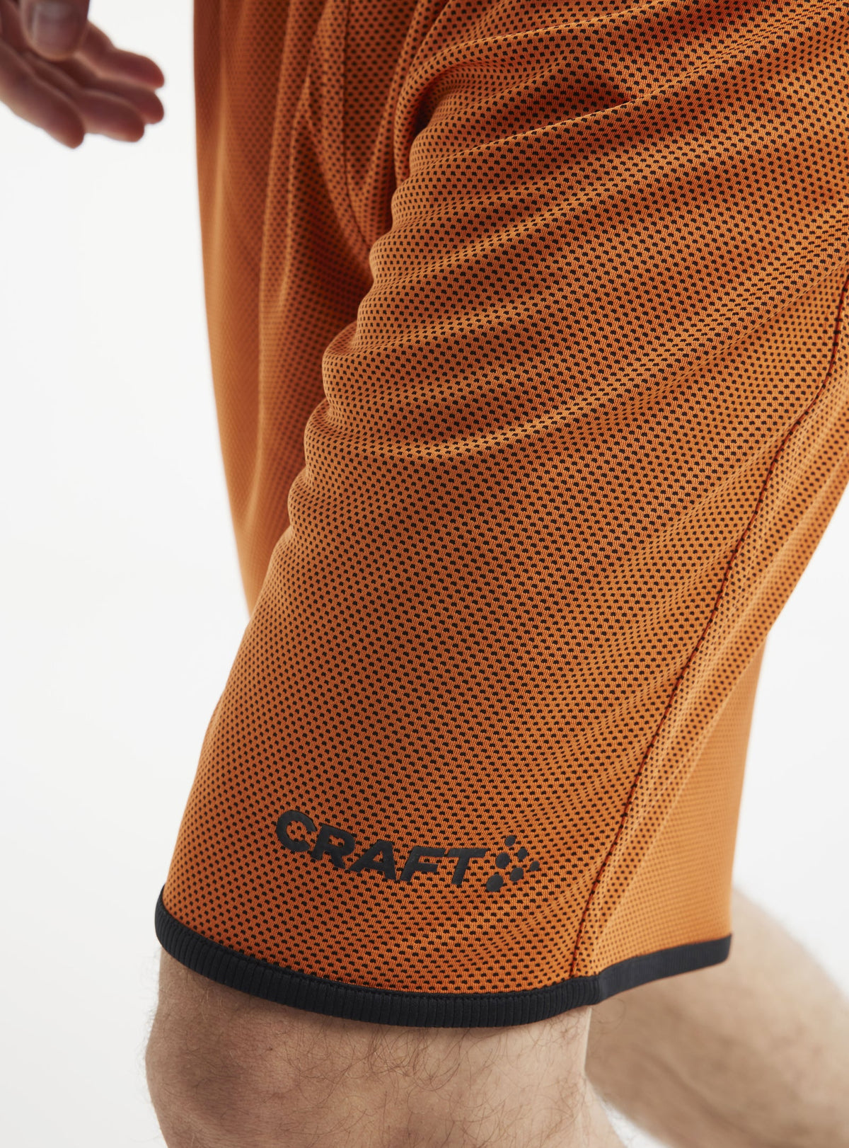 Craft Progress Reversible Basket Shorts Herren in Orange/Schwarz, Detailansicht