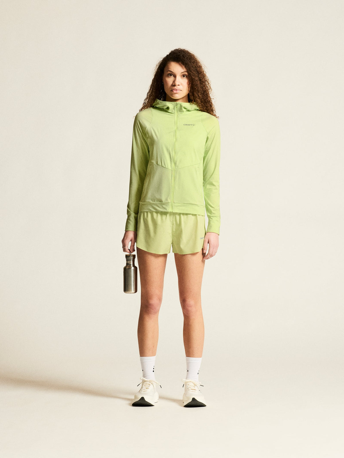Craft ADV Essence Jersey Hood Jacket 2 Damen in Grün, Detailansicht