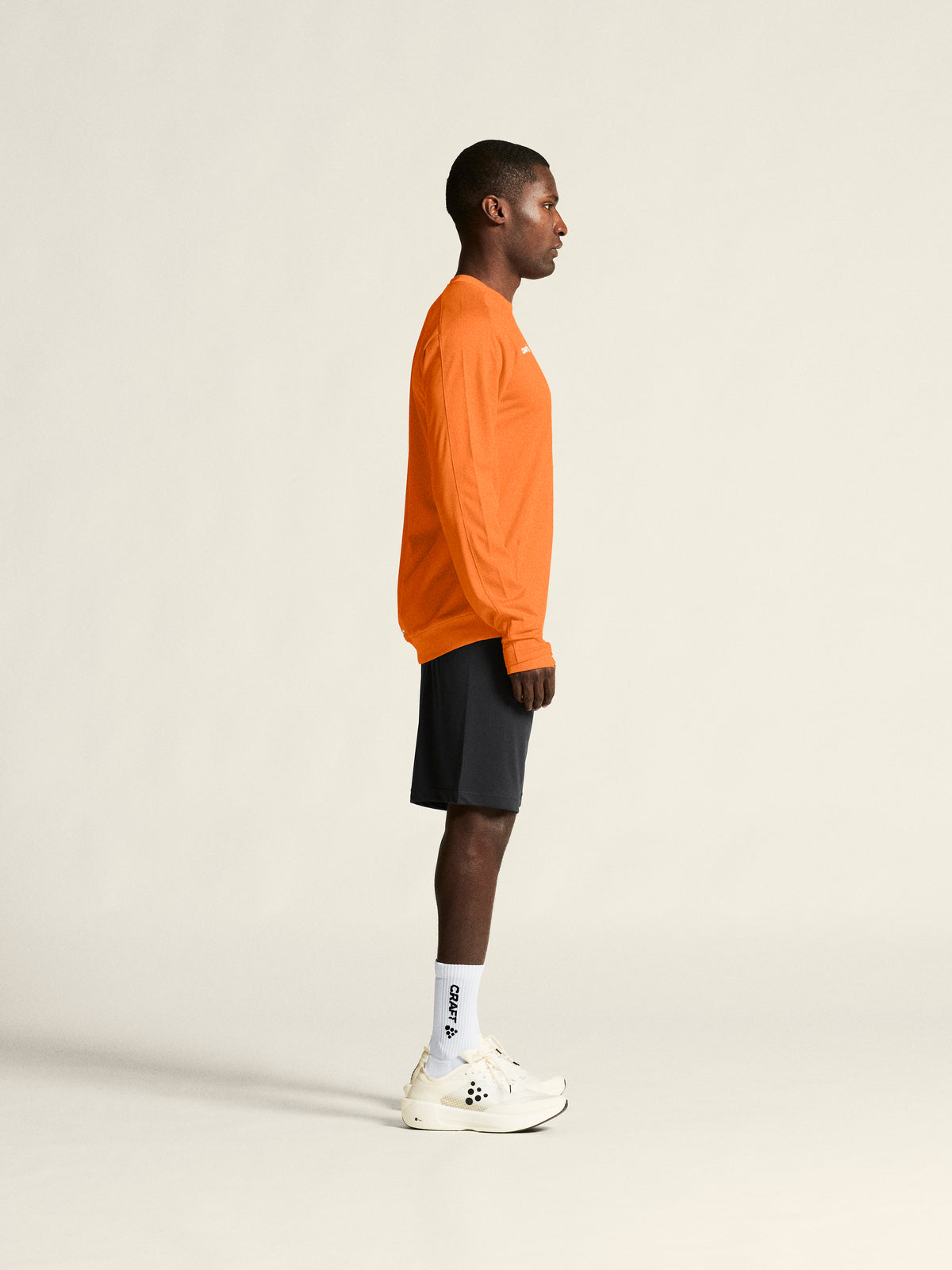 Craft Evolve 2.0 Crewneck Herren in Orange, Detailansicht
