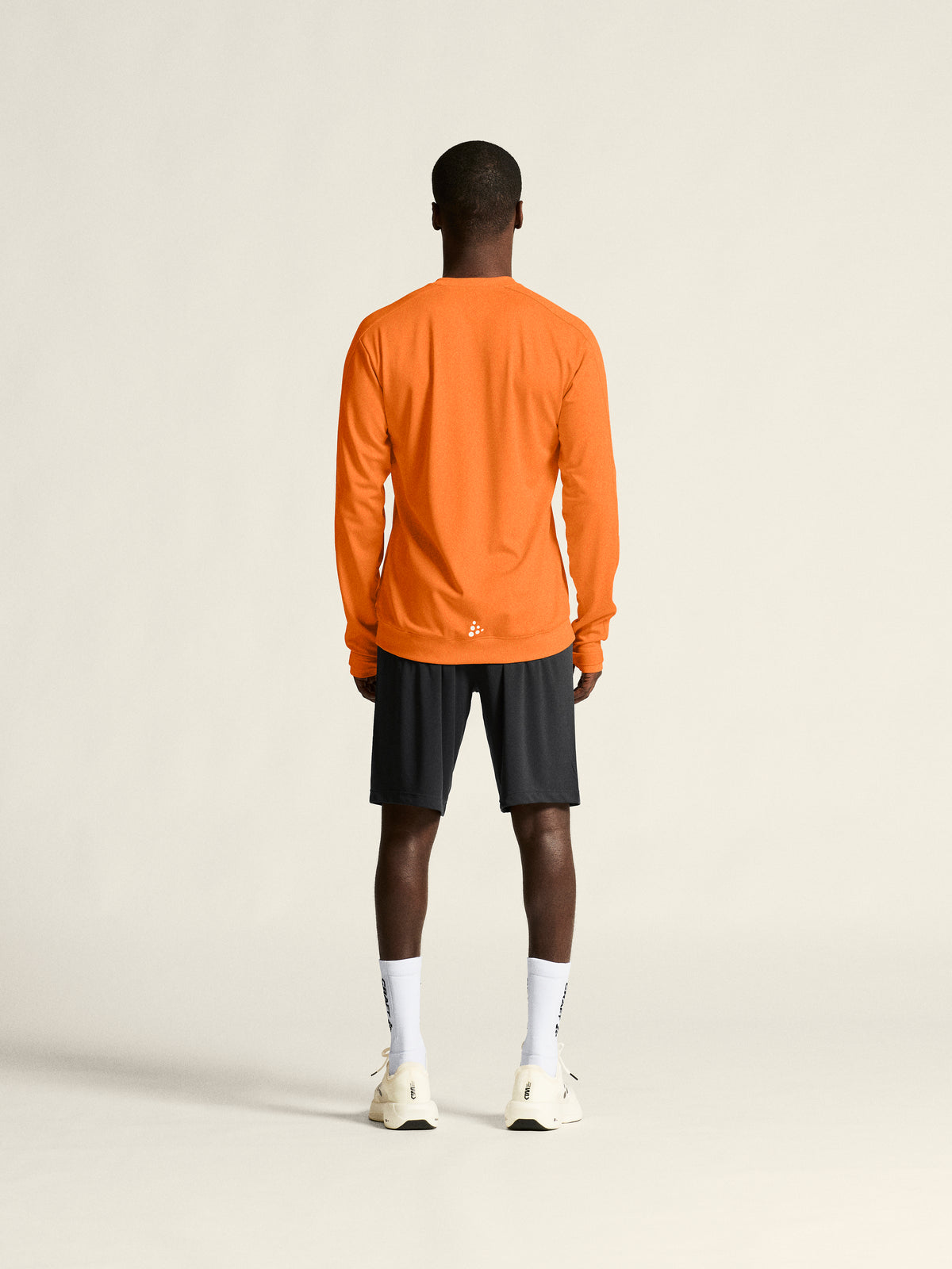 Craft Evolve 2.0 Crewneck Herren in Orange, Detailansicht