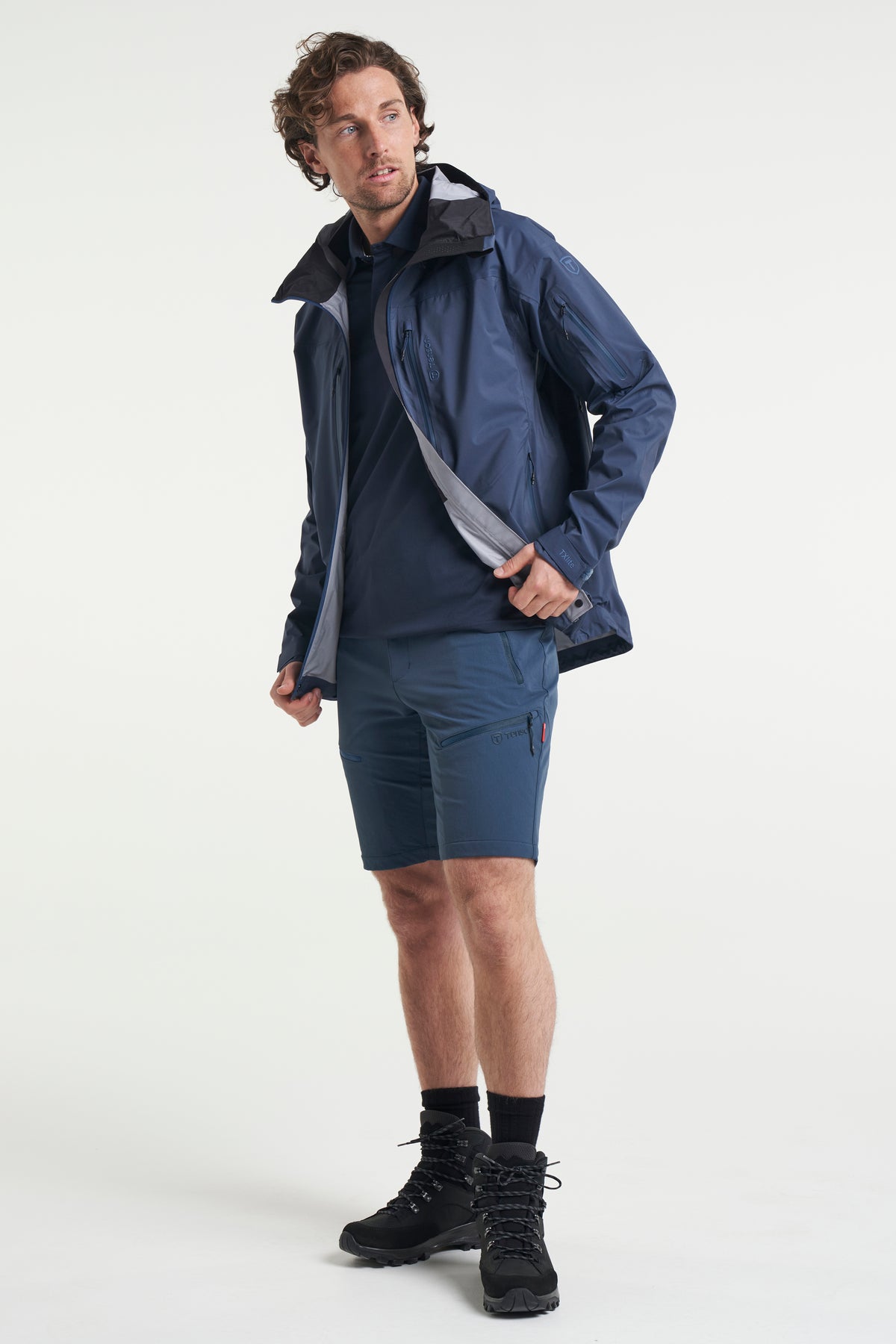 Tenson TXlite Flex Shorts Men Dunkelblau, Produktansicht