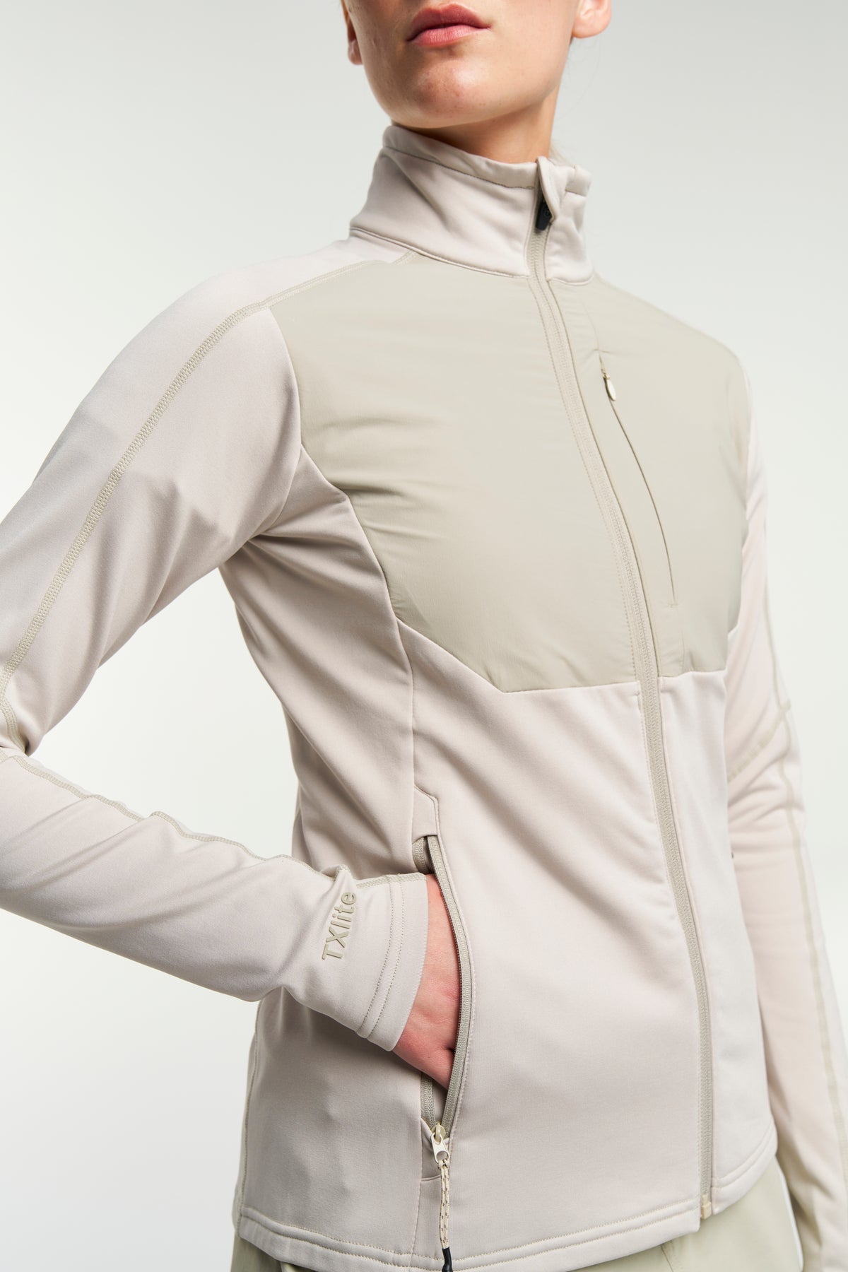 Tenson TXlite Windblock Hybrid Zip Women Sand, Produktansicht